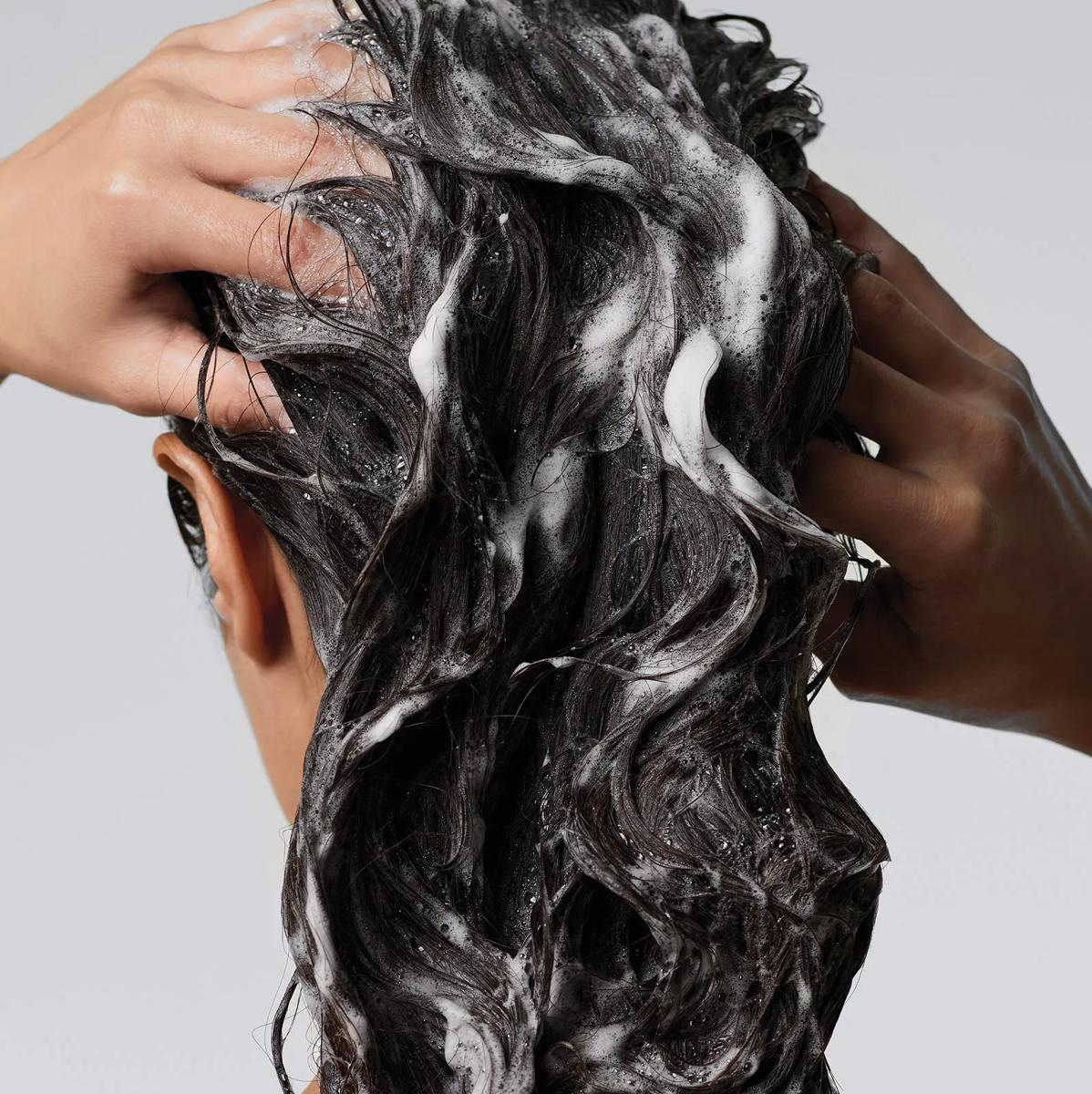 image of a woman washing her hair