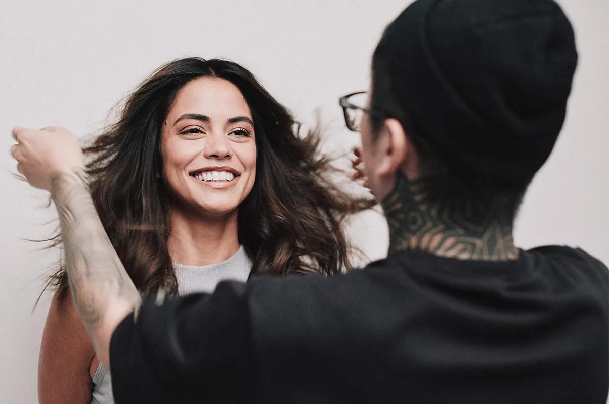 image of a woman having her hair styled by Noogie Thai
