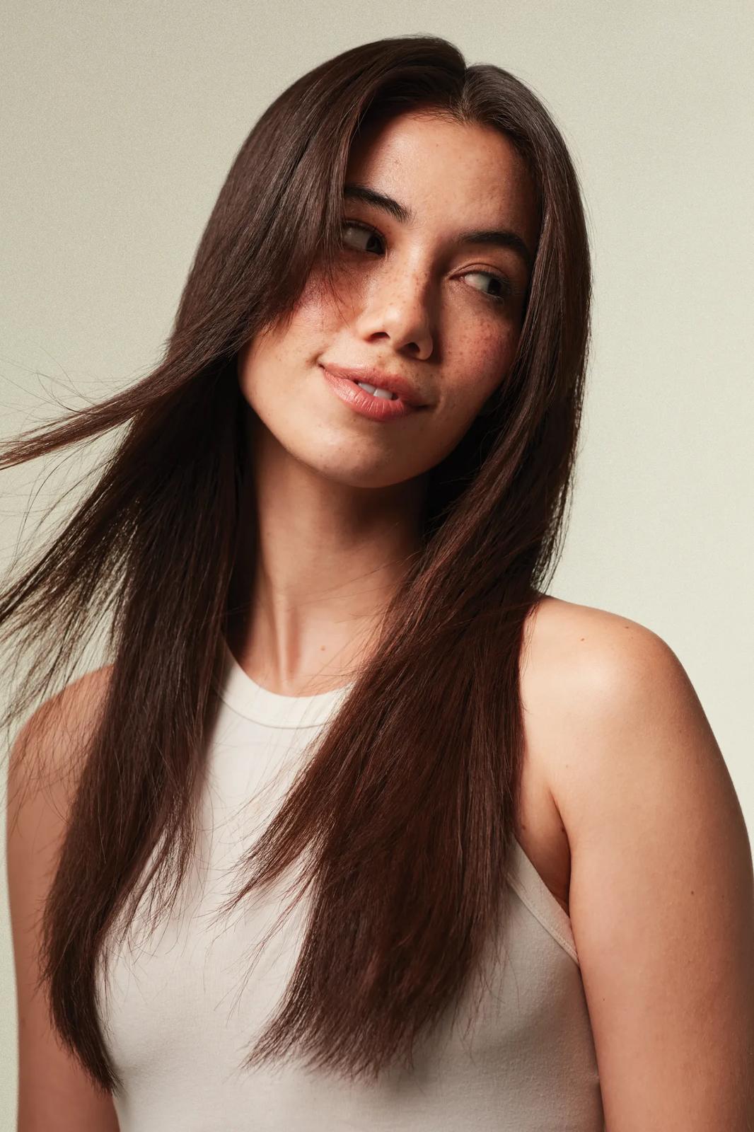 image of a woman with long brown hair