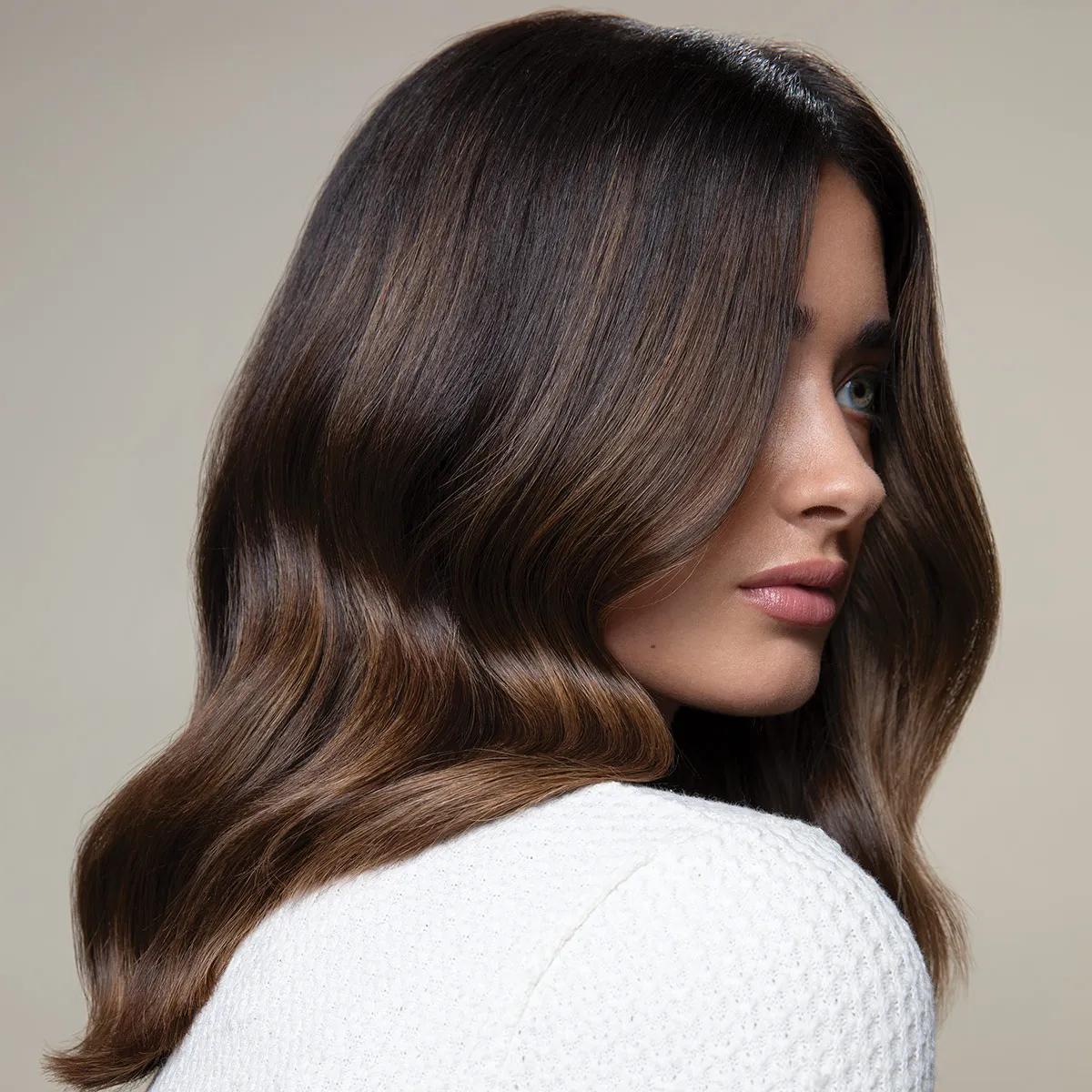 image of a woman with long, chocolate hair