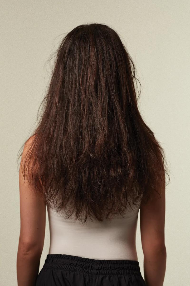 image of a woman with dry, damaged hair