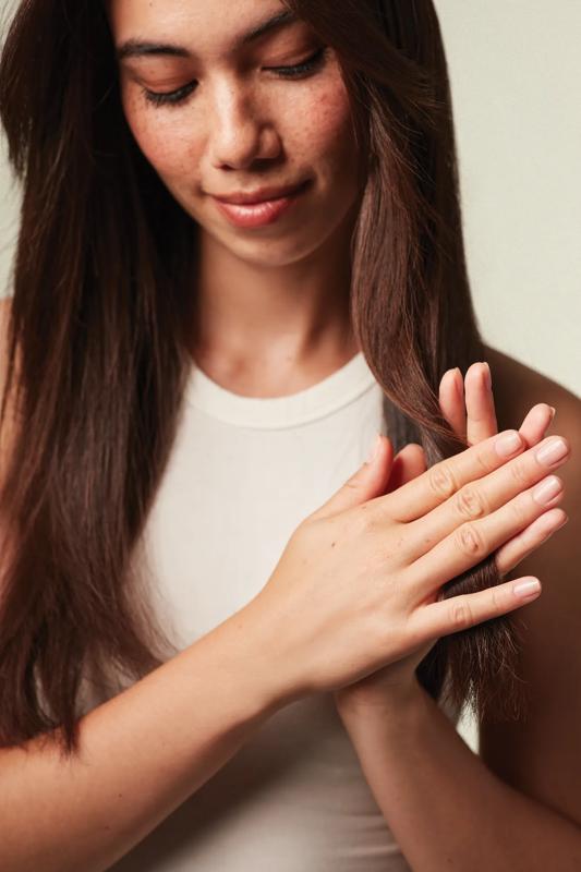 image of a woman with long brown hair