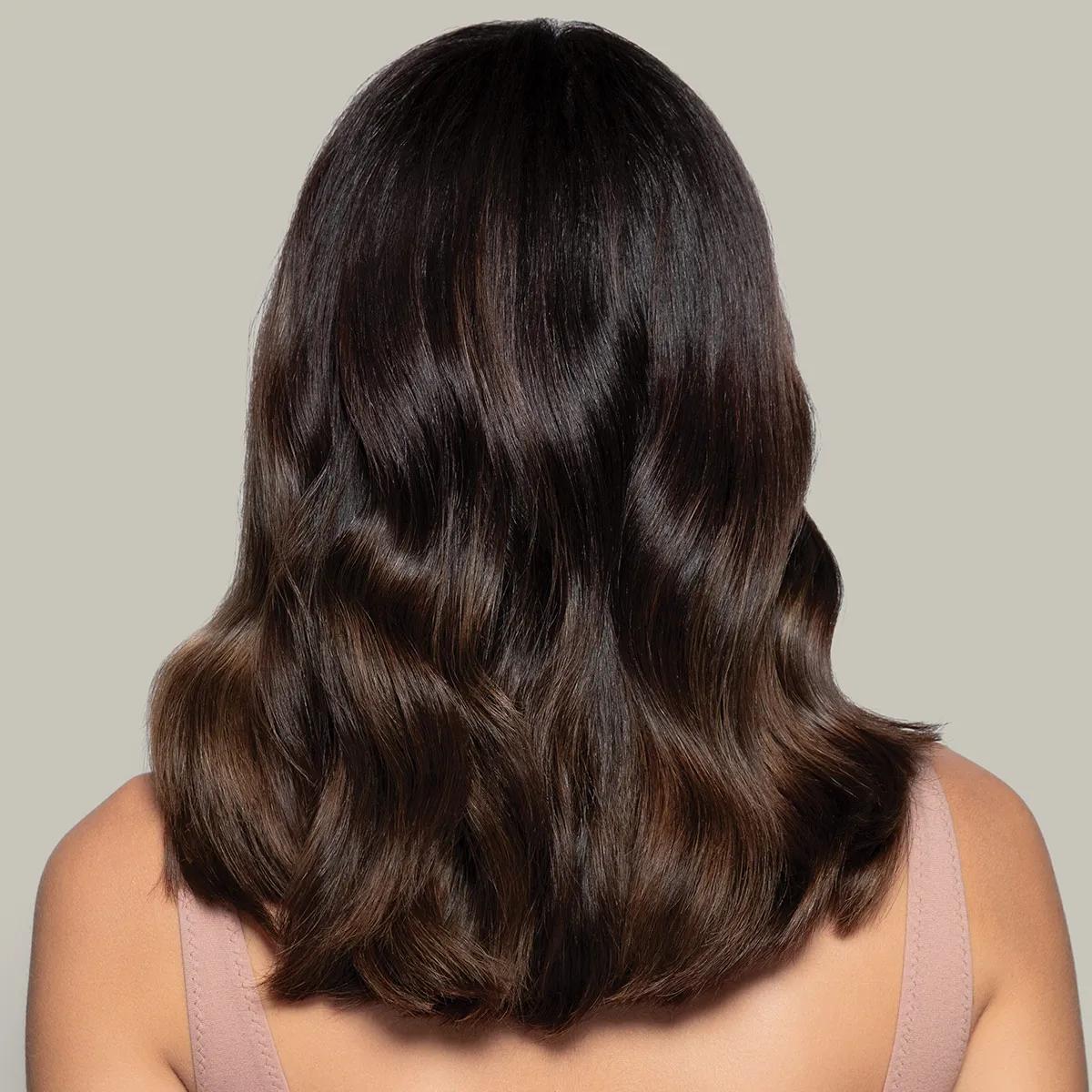 image of a woman with long, chocolate hair