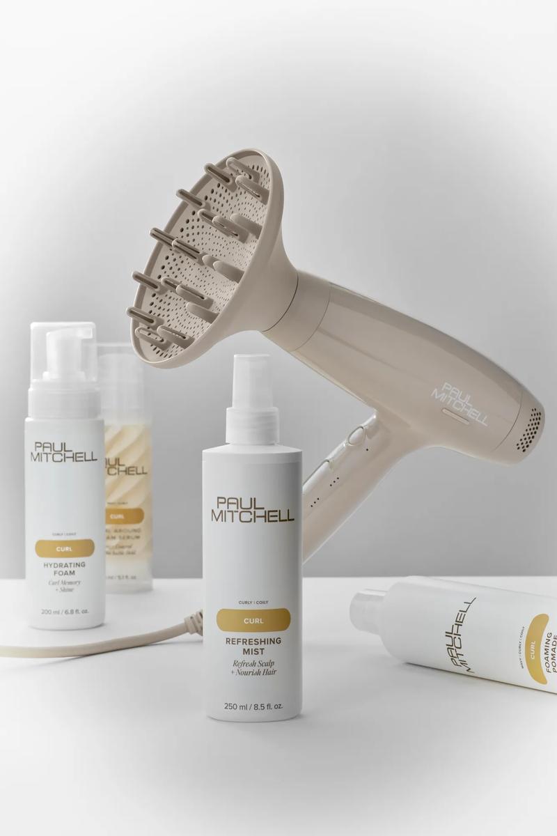 group image of the Paul Mitchell Dry Hair Dryer with Paul Mitchell Curl collection products